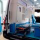 Interior de ambulância transformada pela Carmovel em chassi L2H2, com maca, cadeira e móveis sob medida